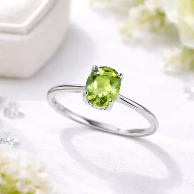Natural peridot oval cut sterling silver ring — product image 1