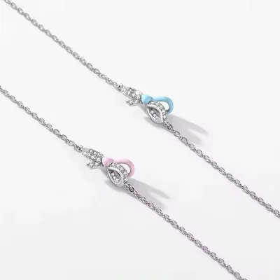 Dainty bowtie link chain bracelet in sterling silver — product image 1