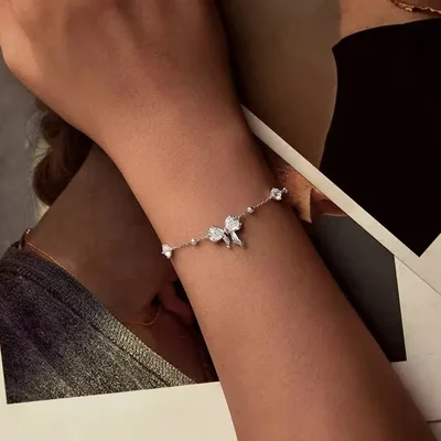 Bowtie sterling silver chain bracelet — product image 1