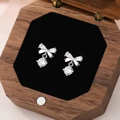 Bowtie with CZ drop silver stud earrings