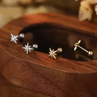 Tiny starburst screw back stud earrings — product image 1