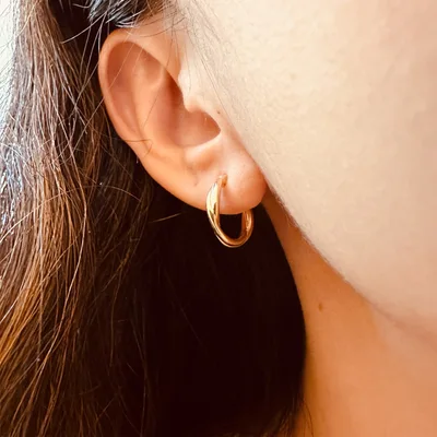 Gold plated silver twist hoop earrings — product image 1