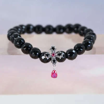 Black agate beaded bracelet with black cross charm — product image 1