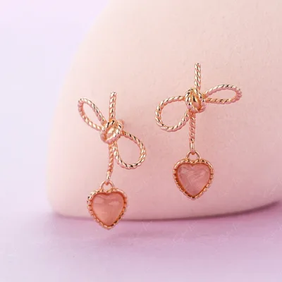 Rose gold bowtie heart drop sterling silver earrings — product image 1