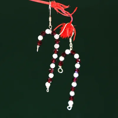Red garnet and moonstone candy cane earrings — product image 1