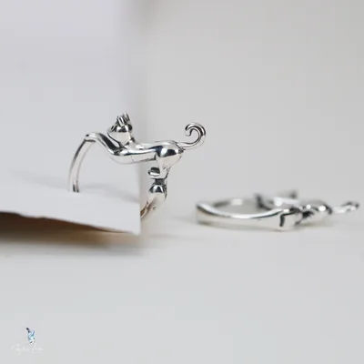 Hanging cat hoop earrings in sterling silver — product image 1