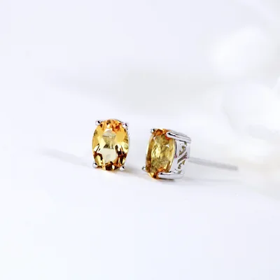 Oval cut natural Citrine egg shape silver stud earrings — product image 1