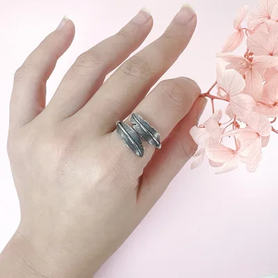Feather wrap oxidized sterling silver ring — product image 1