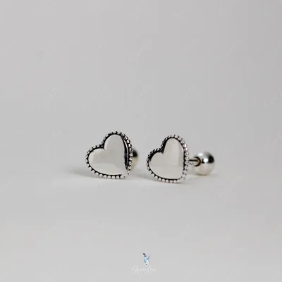 Border heart screw ball back stud earrings — product image 1