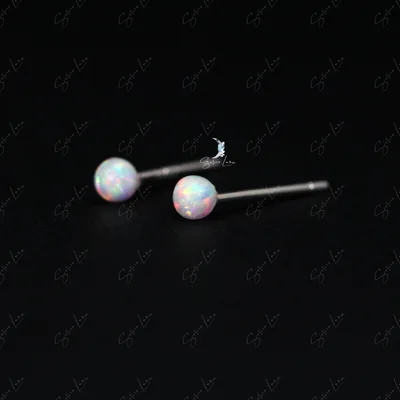 Tiny opal stone stud earrings with sterling silver post — product image 1