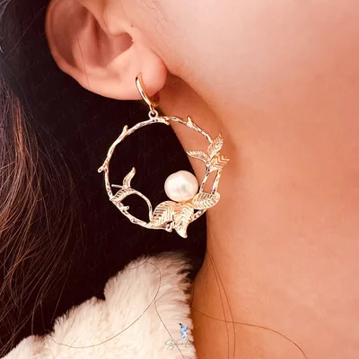 Fresh water pearl on leave tree branch earrings — product image 1