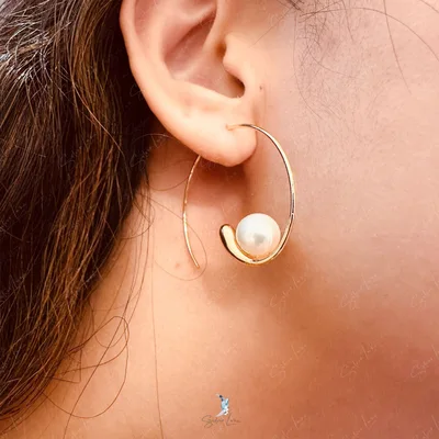 Freshwater pearl spiral gold plated earrings — product image 1