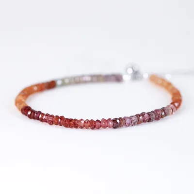 Rainbow color faceted garnet gemstone sterling silver bracelet — product image 1