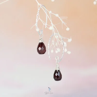 Teardrop red garnet sterling silver earrings — product image 1