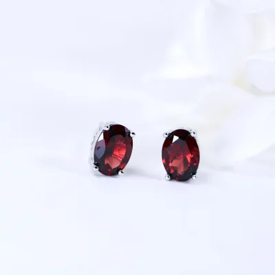 Oval cut egg shape natural red garnet silver stud earrings — product image 1