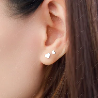 Tiny Valentine hearts sterling silver stud earrings — product image 1