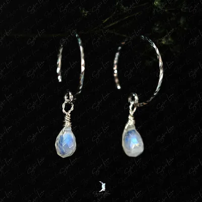 Teardrop moonstone textured silver earrings — product image 1