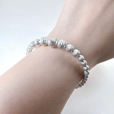 Sterling silver texture ball beaded bangle bracelet — product image 1