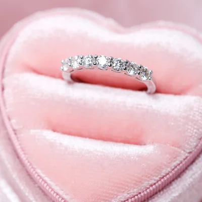 0.7 CT Moissanite wedding band in sterling silver — product image 1